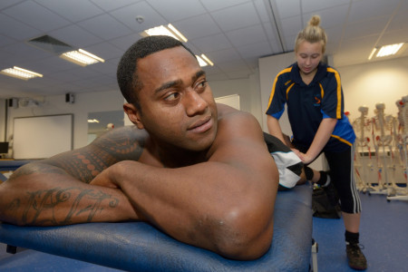 Fiji World Cup Rugby Player receiving treatment in Bolton One