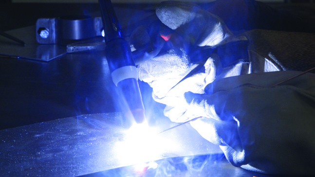 An NCME student TIG welding at the University of Bolton