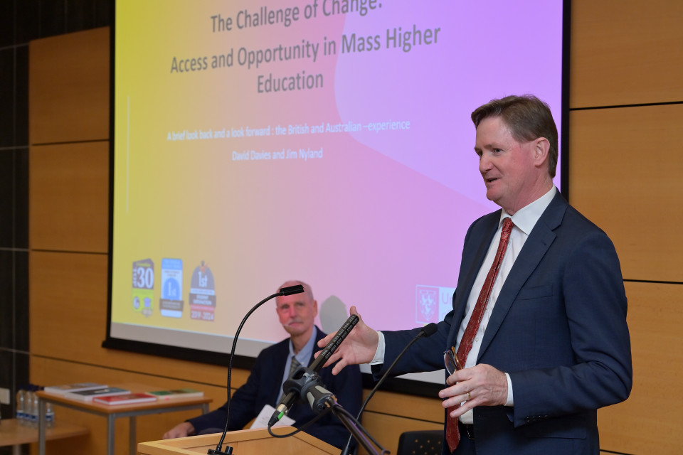 Professor Jim Nyland speaking in the Deane Lecture Theatre at the University of Bolton, Greater Manchester, about his contribution to the book and its findings